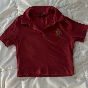 Red crop top with small bear design.